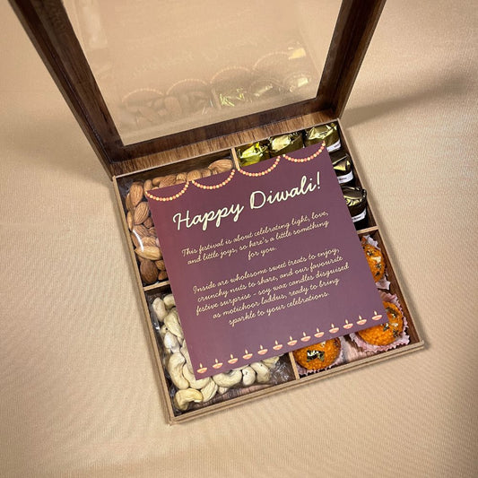 Premium Diwali Gift Box with Assorted Dates Chocolates, Almonds, Cashews, Soy Wax Motichoor Candles, Wooden Box, 500g