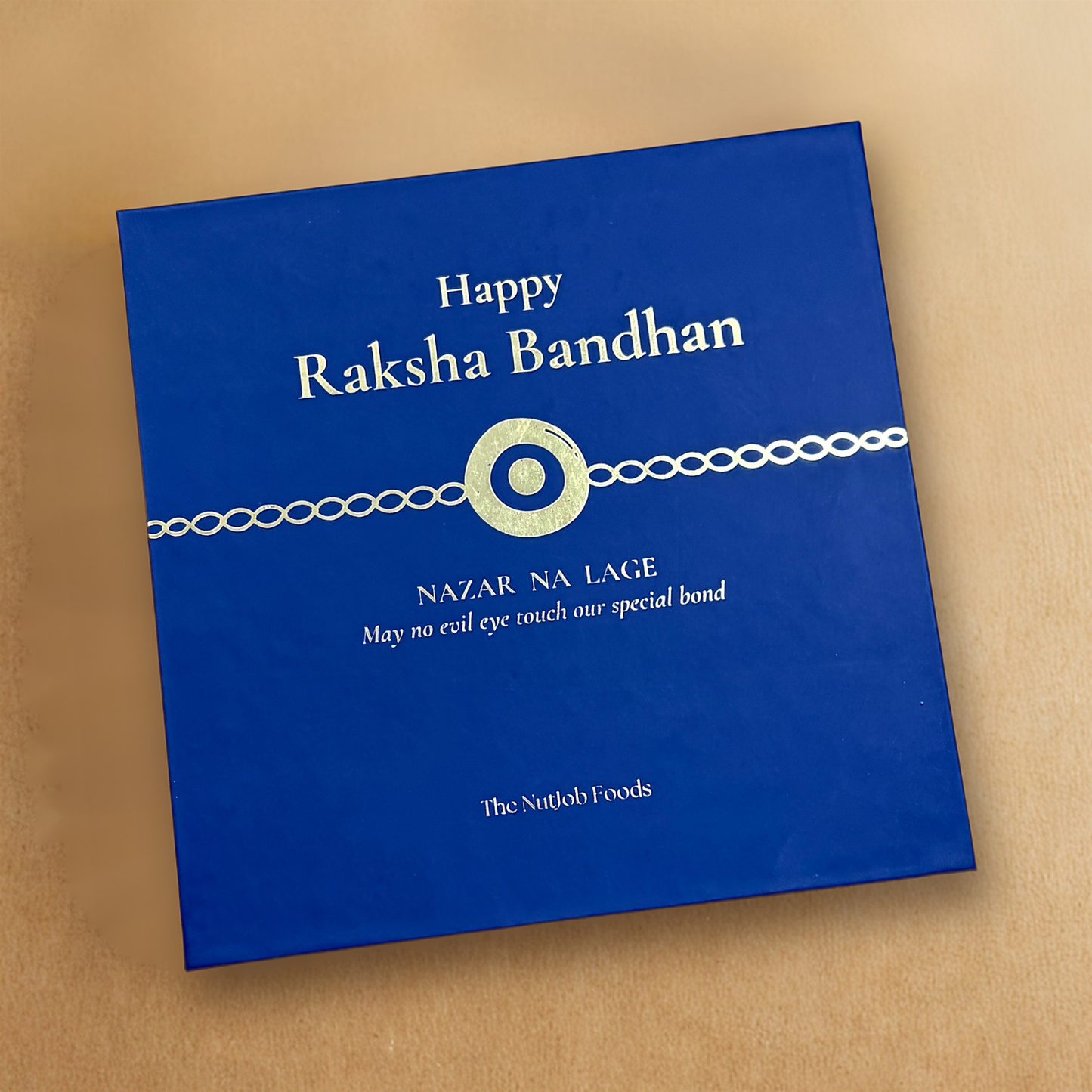 Raksha Bandhan Nazar Na Lage Gift Box - 4 Items Assortment with Evil Eye Rakhi & Roli Chawal