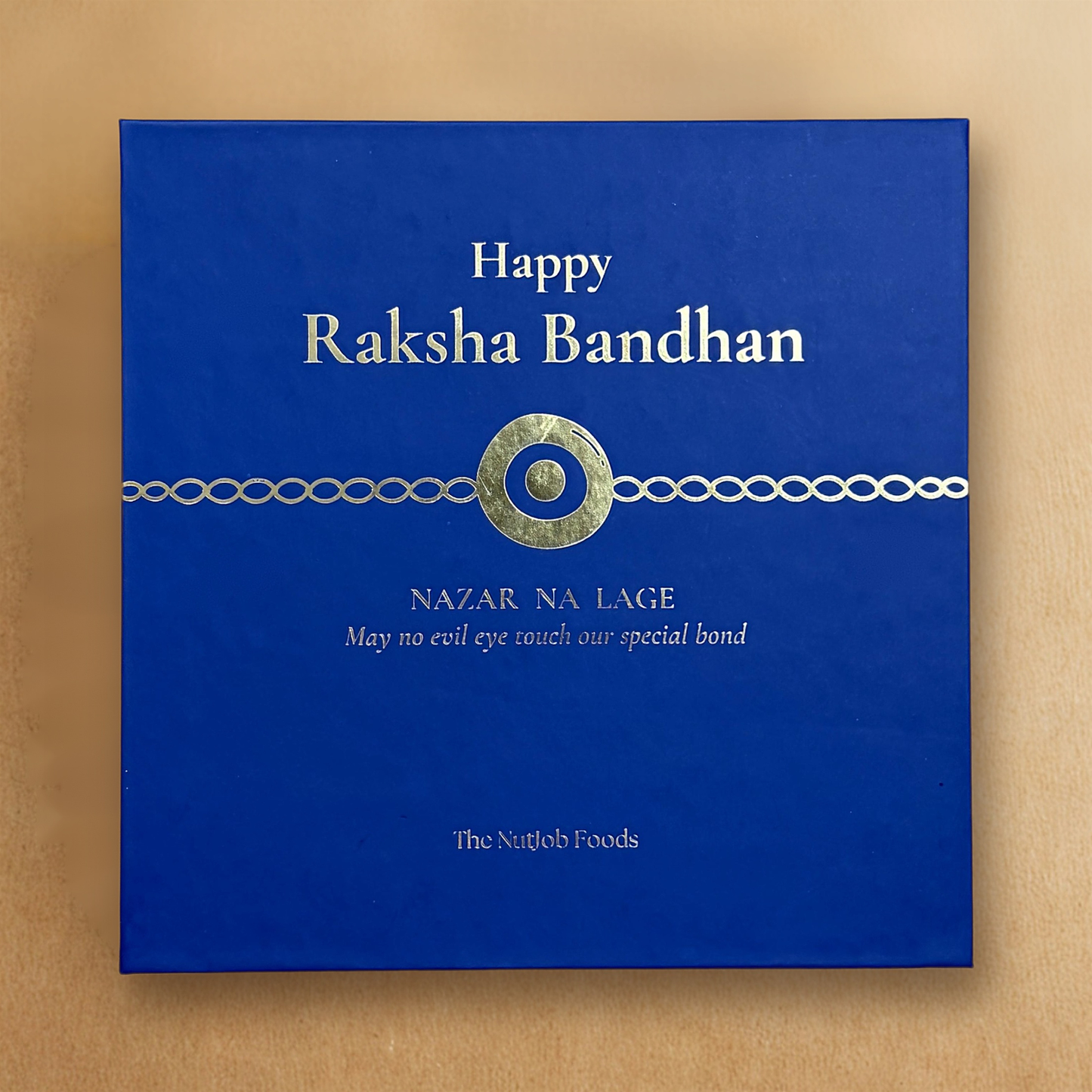Raksha Bandhan Nazar Na Lage Gift Box - 4 Items Assortment with Evil Eye Rakhi & Roli Chawal