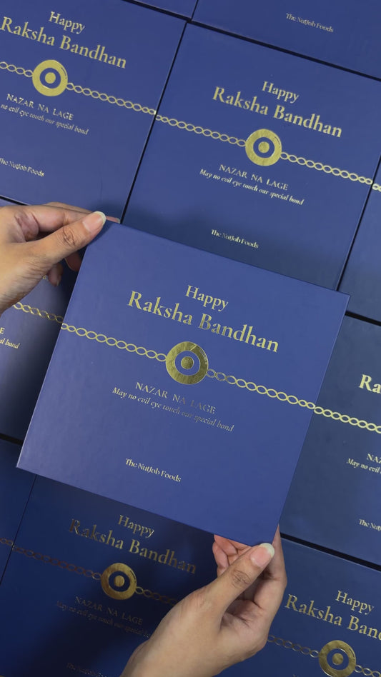 Raksha Bandhan Nazar Na Lage Gift Box - 4 Items Assortment with Evil Eye Rakhi & Roli Chawal